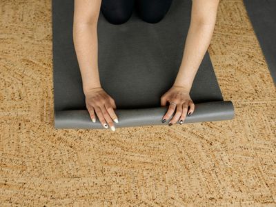 Person in a state of calm focus before starting a workout.